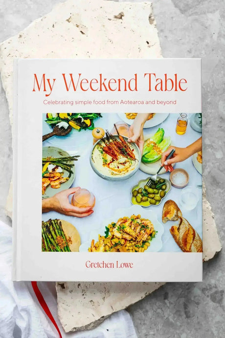 Book titled 'My Weekend Table' by Gretchen Lowe on a textured surface