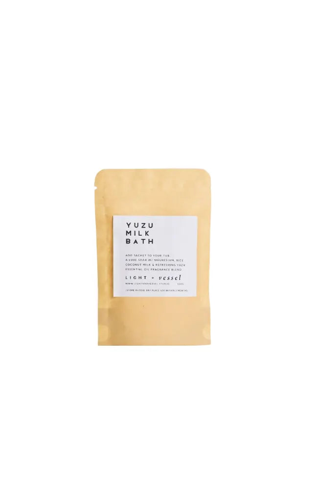 Yuzu Milk Bath package with a white label on a white background.